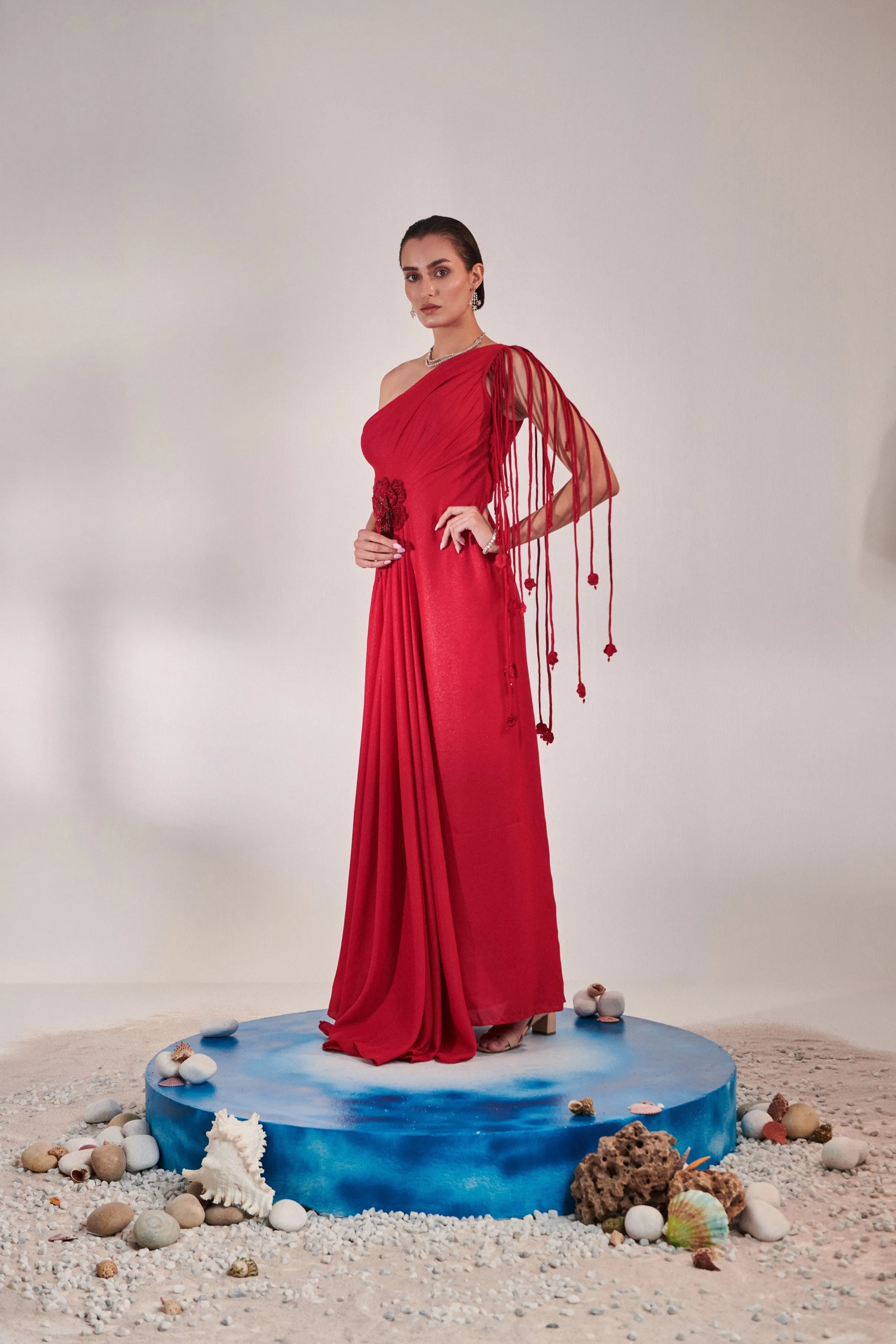 Draped scarlet gown with 3d hand embroidered flower detail on front
